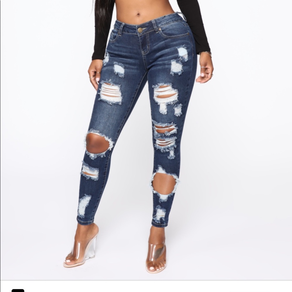 Dark blue distressed jeans